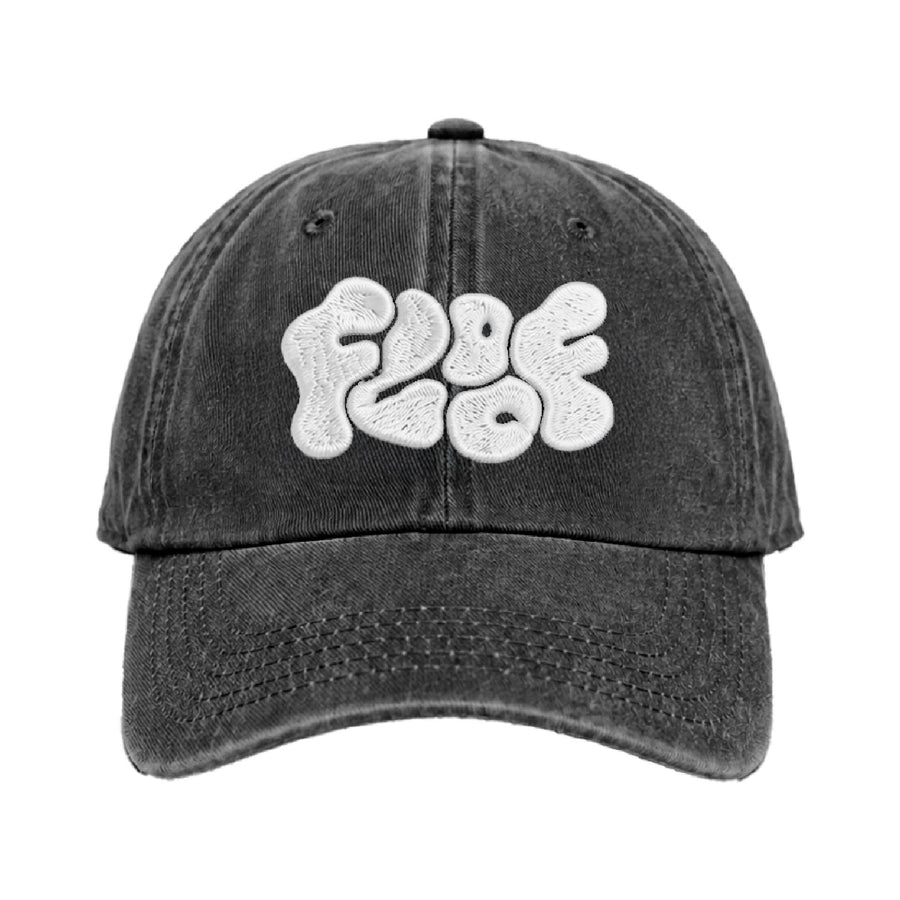 Washed black cap with the Floof wordmark in white puff embroidery