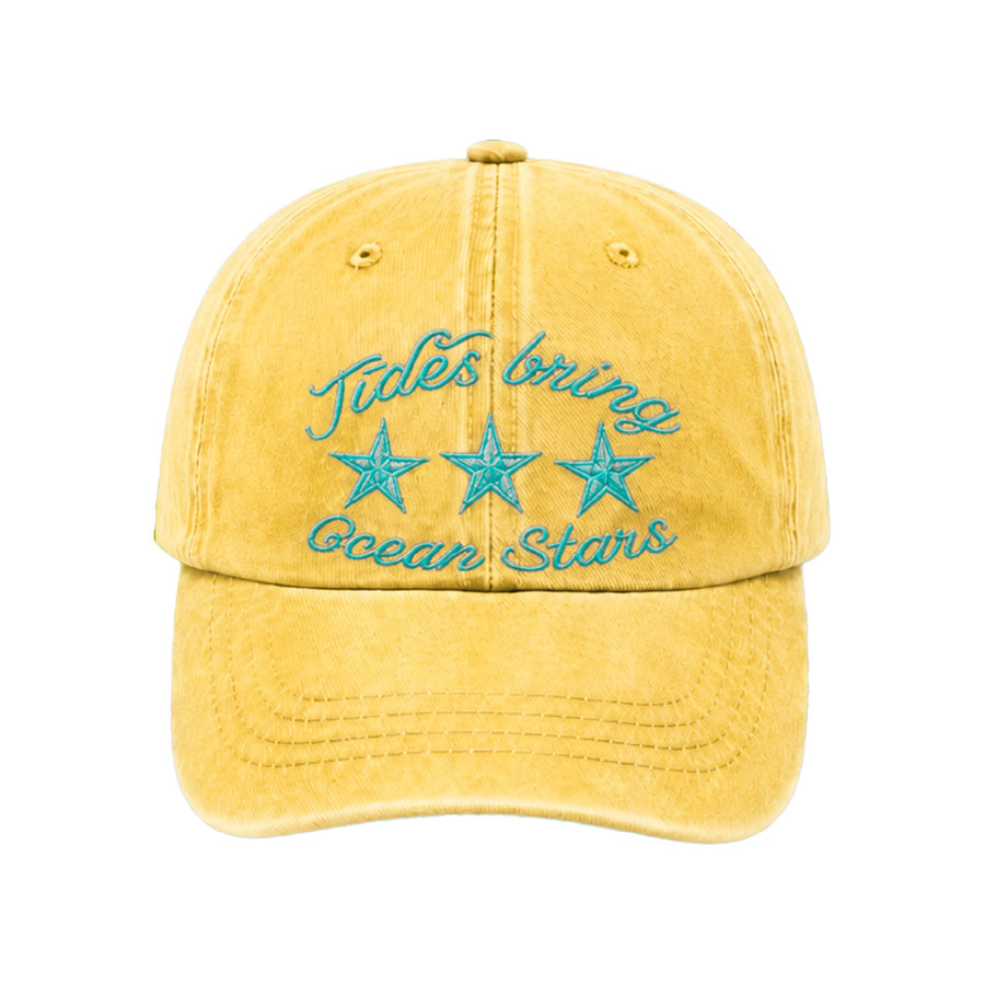 Butter yellow cap with Tides bring ocean stars in teal script above three teal starfish