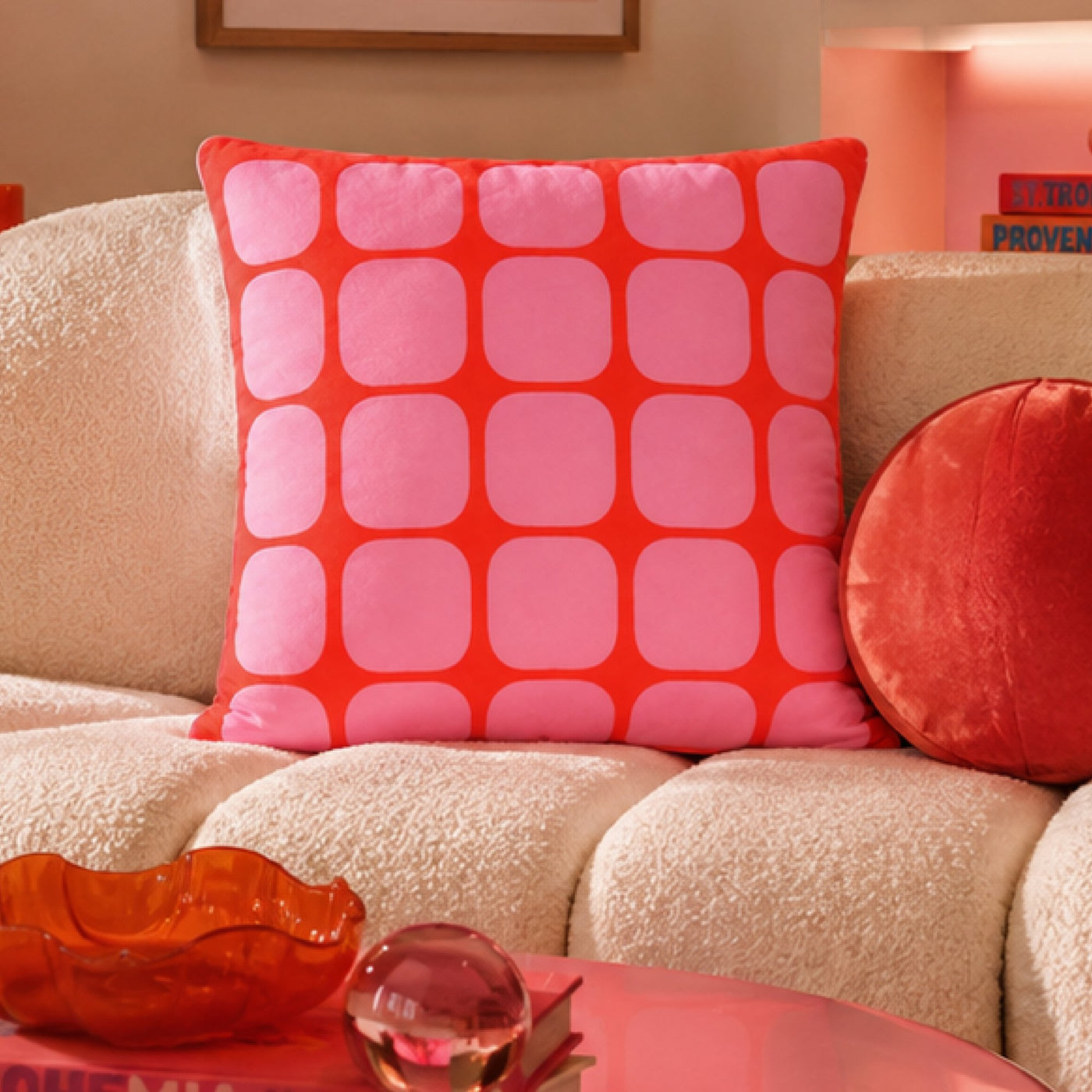 Sorbet Grid cushion on a cream sofa