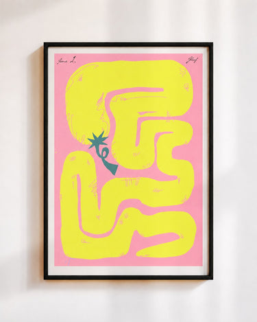 Felfela poster in yellow, in a black frame on a white wall: a yellow chilli pepper looping into a maze on pink