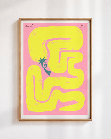 Felfela poster in yellow, in a wooden frame on a white wall: a yellow chilli pepper looping into a maze on pink
