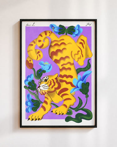 Garden Tiger poster in purple, in a black frame on a white wall: a yellow striped tiger among blue and coral flowers on a violet background