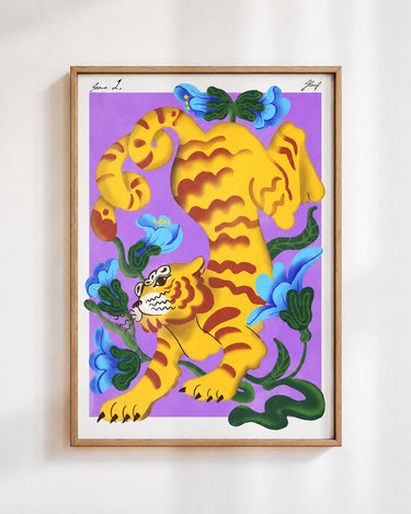 Garden Tiger poster in purple, in a wooden frame on a white wall: a yellow striped tiger among blue and coral flowers on a violet background