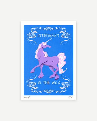 Introvert in the Wild poster print: a lilac unicorn inside white swirls on cobalt blue, with the words Introvert in the Wild