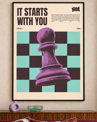 It Starts With You poster framed above a sideboard and checked cushions