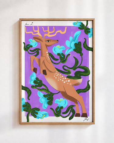 Leaping Deer poster in purple, in a wooden frame on a white wall: a spotted deer leaping through blue and coral flowers and green vines on a violet background