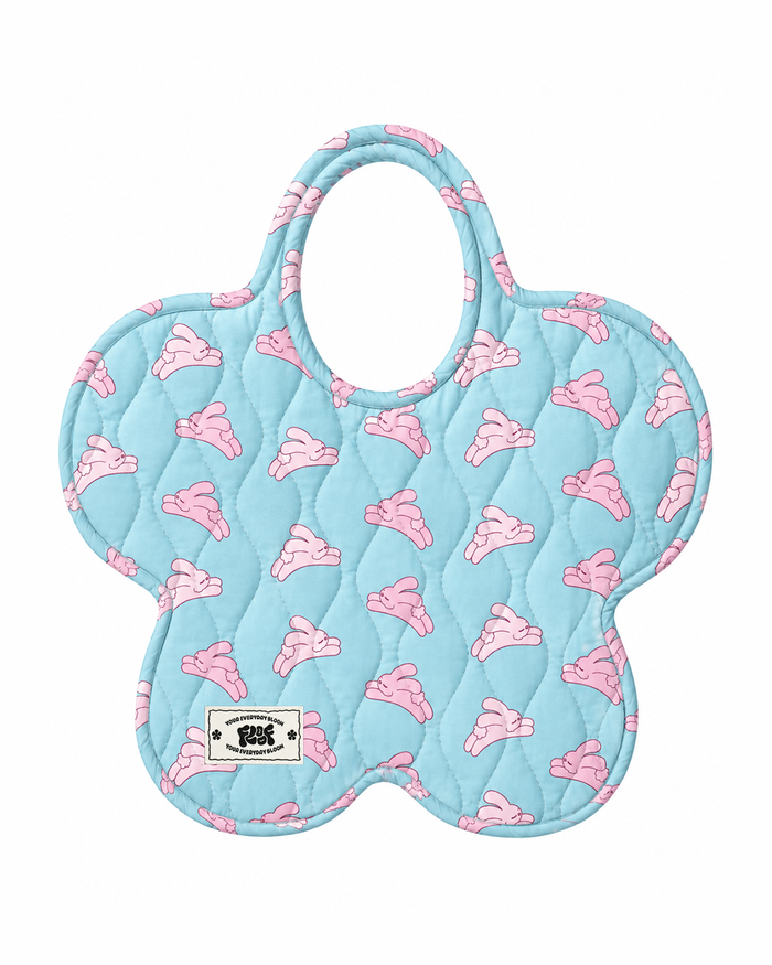Sleepy Bunny Bag, a quilted flower-shaped tote in sky blue with pink bunnies