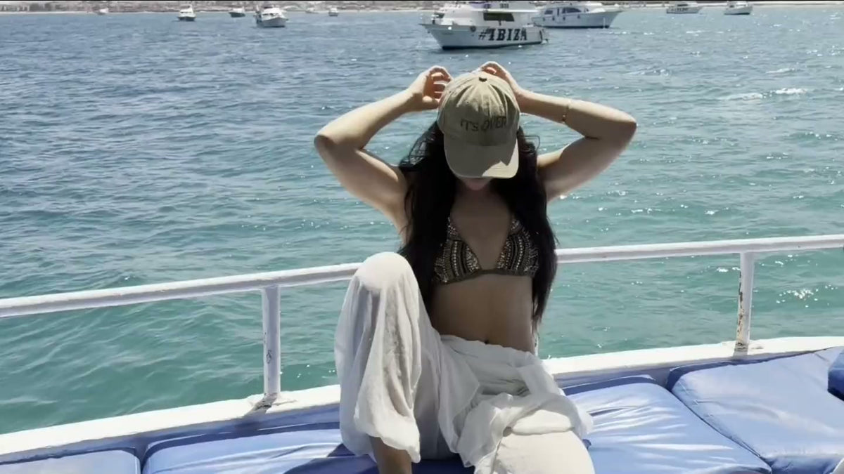 A friend in a Floof cap on a boat in the Red Sea