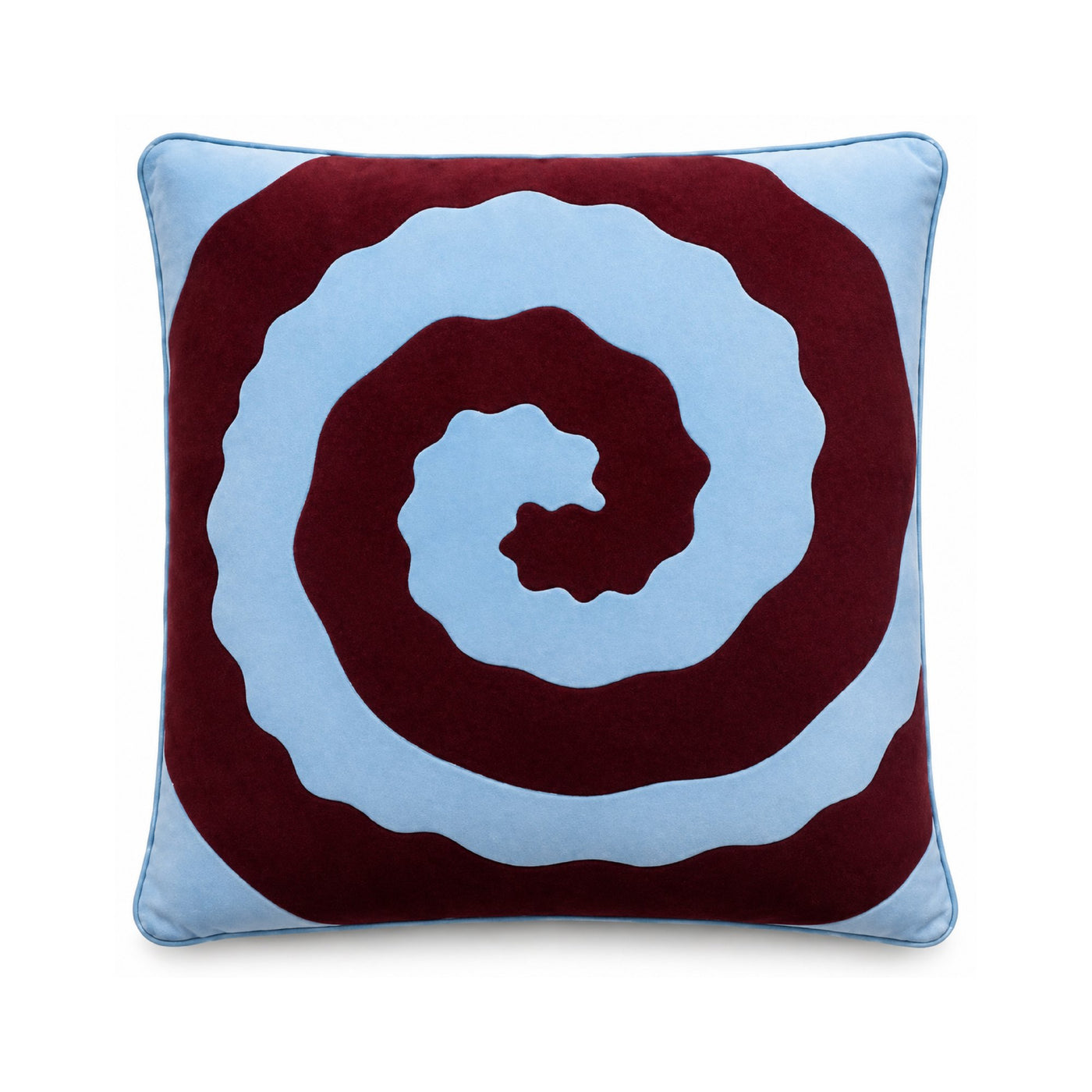 Brownie Swirl cushion, a burgundy spiral on sky blue