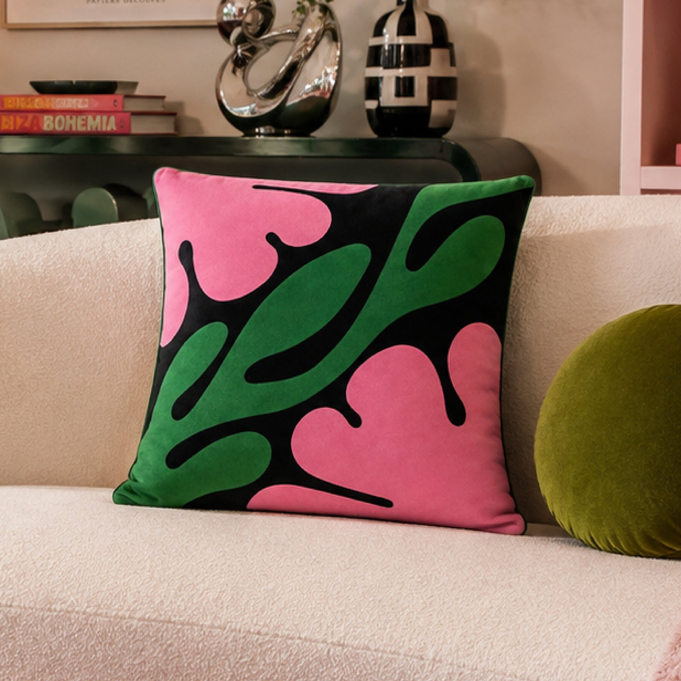 Macaron Leaf cushion on a cream sofa