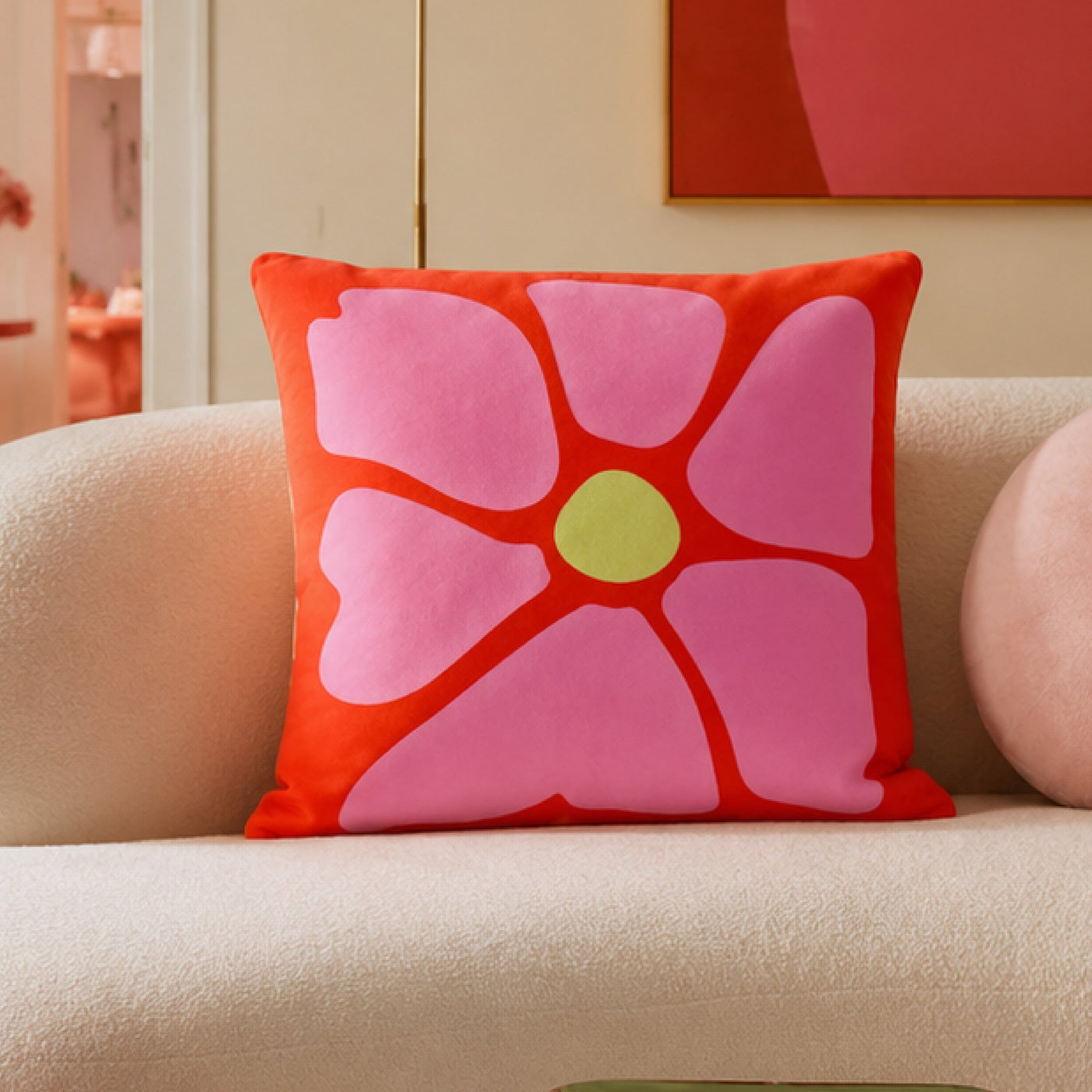 Sorbet Bloom cushion on a cream sofa