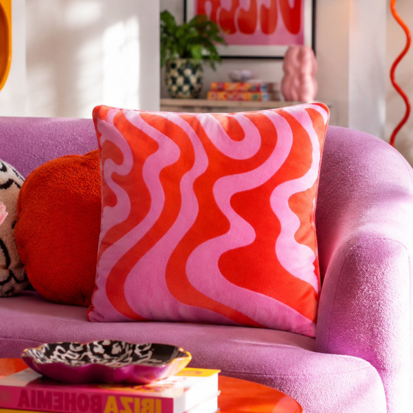 Sorbet Swirl cushion on a pink sofa