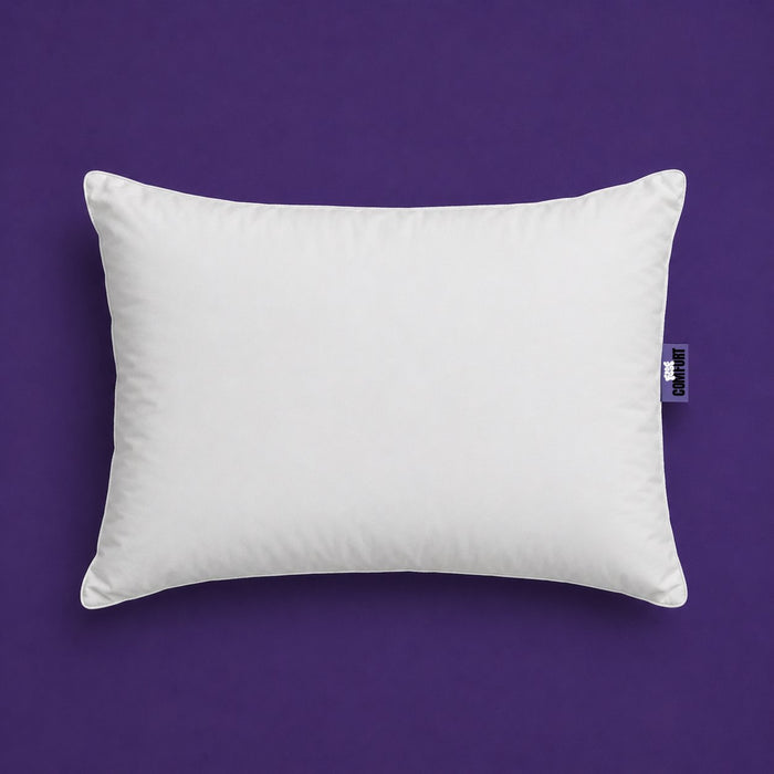 Comfort Hotel Pillow, a white piped sleeping pillow on a purple background