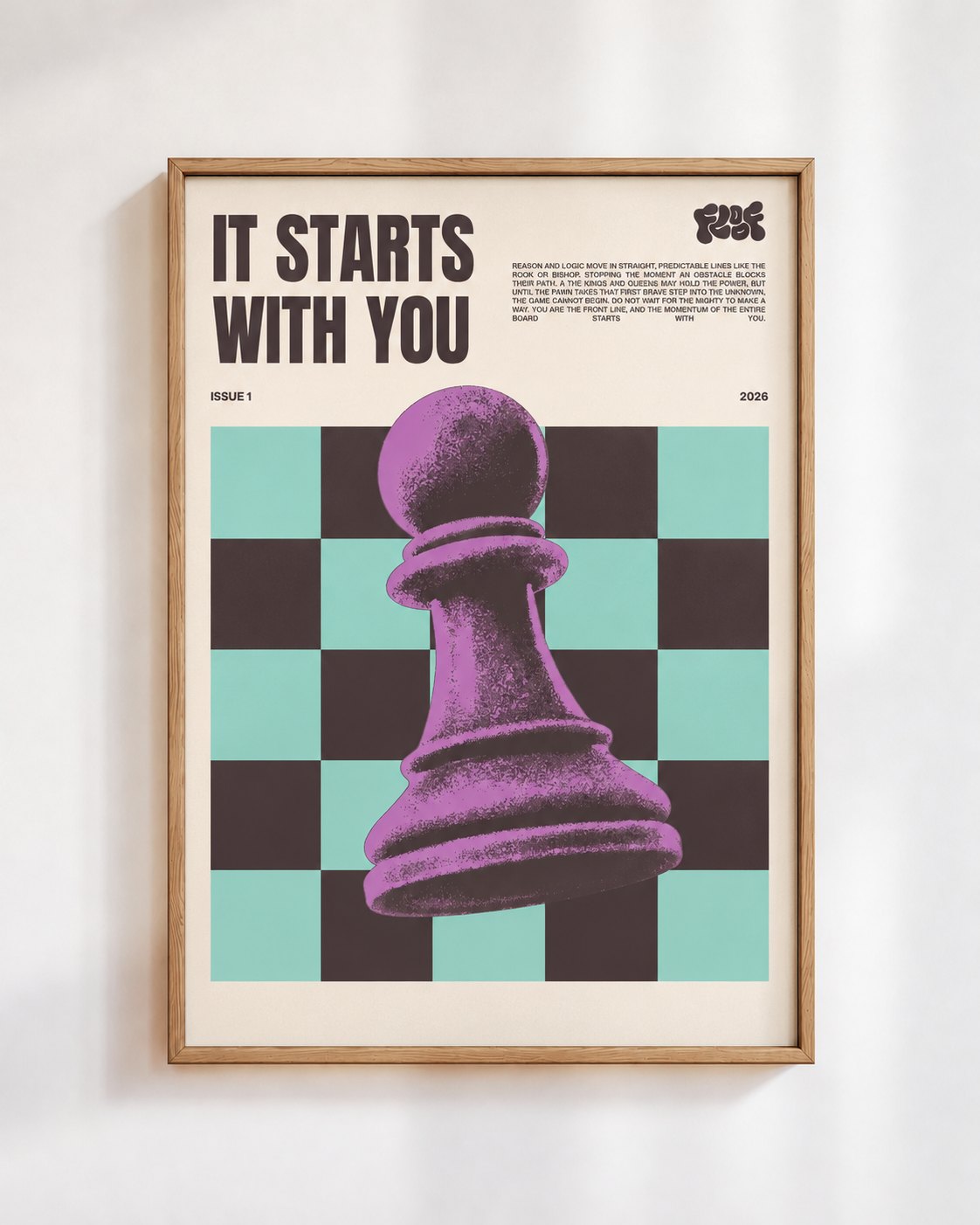 It Starts With You poster in a wooden frame on a white wall: a purple chess pawn on mint and black squares, under the words It Starts With You