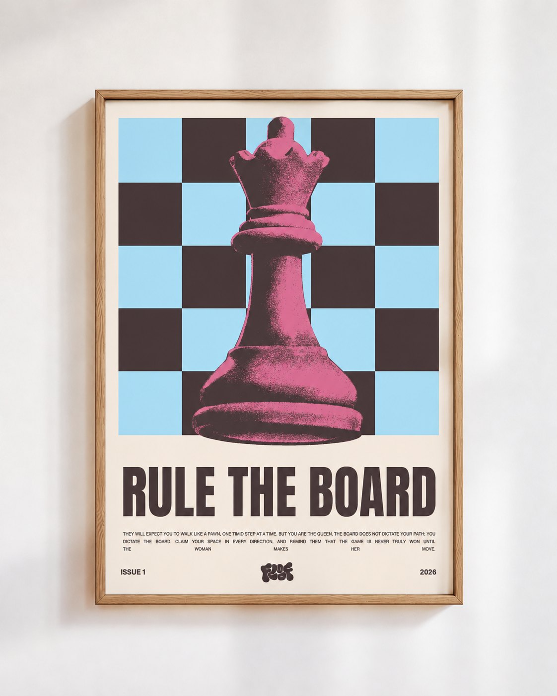Rule the Board poster in a wooden frame on a white wall: a pink chess queen on sky blue and black squares, above the words Rule the Board